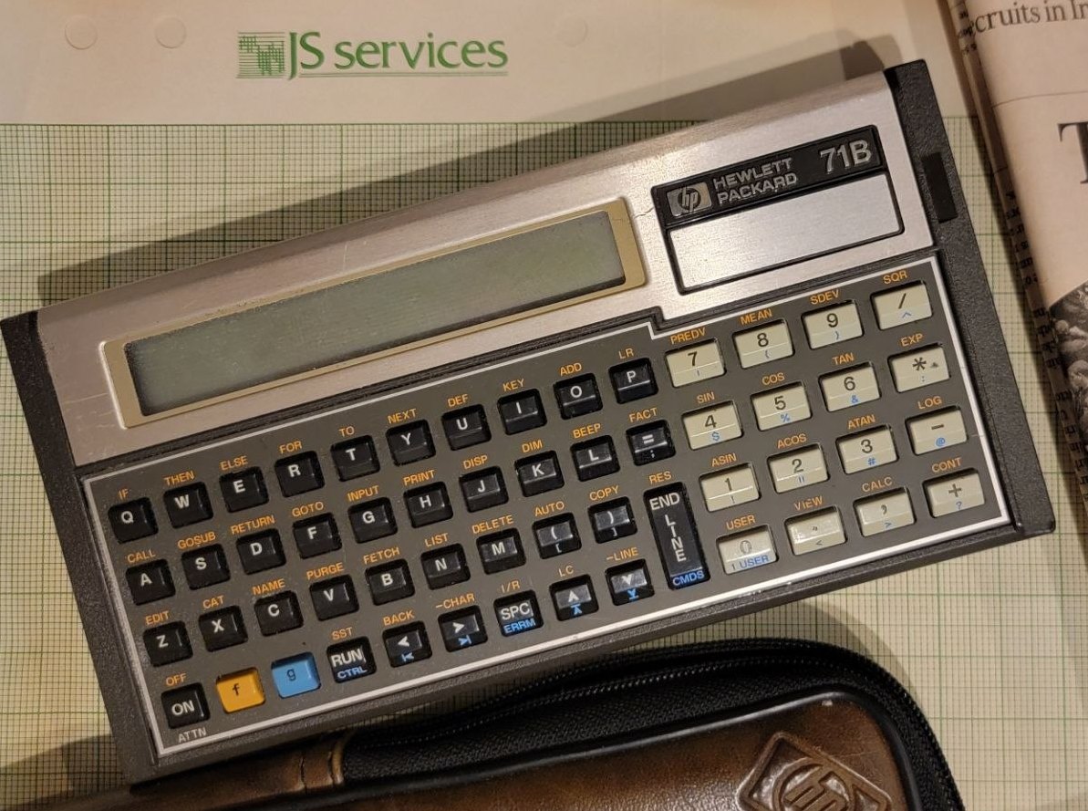 An HP-71B handheld computer on JS Services letterhead